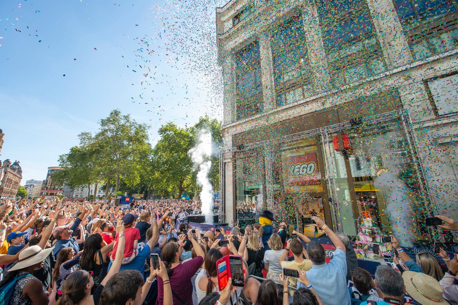 Confetti in the air as the crowd celebrates the store reopening
